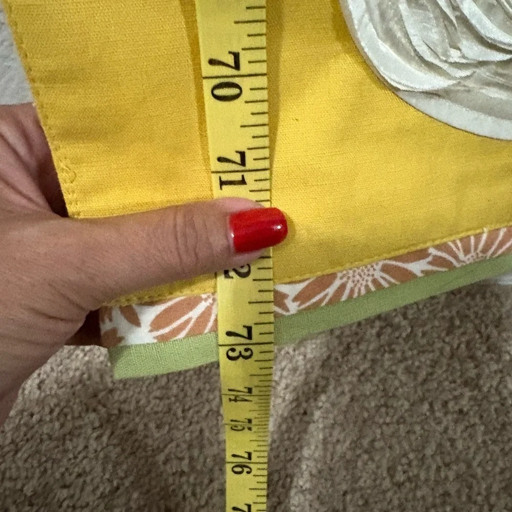 Cute bunny table runner by Pier 1 Imports. Golden yellow with cream bunnies.